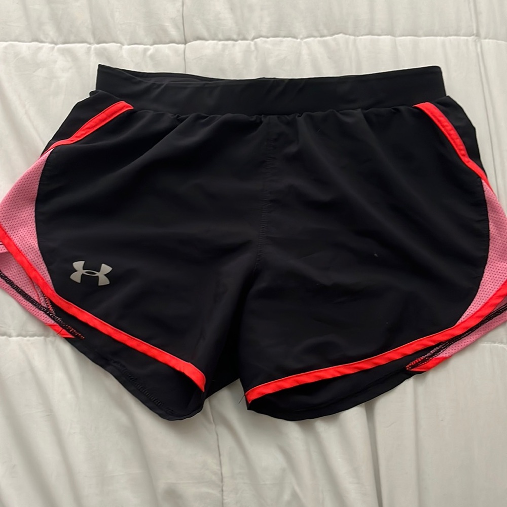 Under Armor women’s xs pink shorts.great condition. built in shorts and strings.